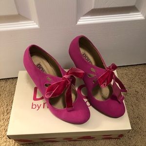 Hot pink bow tie heels.